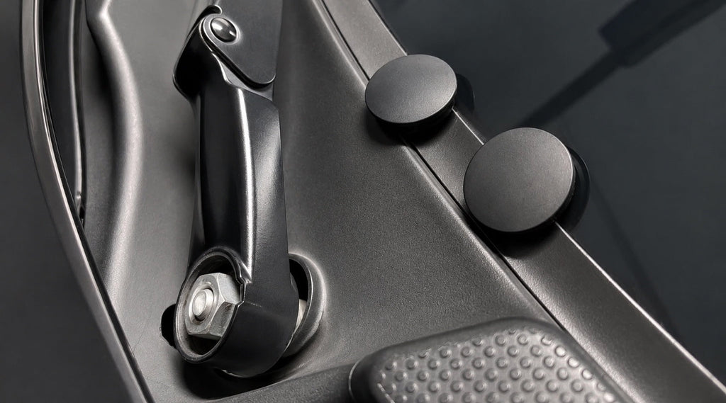 Porsche 997 front wiper arm cover cap installed close up showing wiper arm nut area